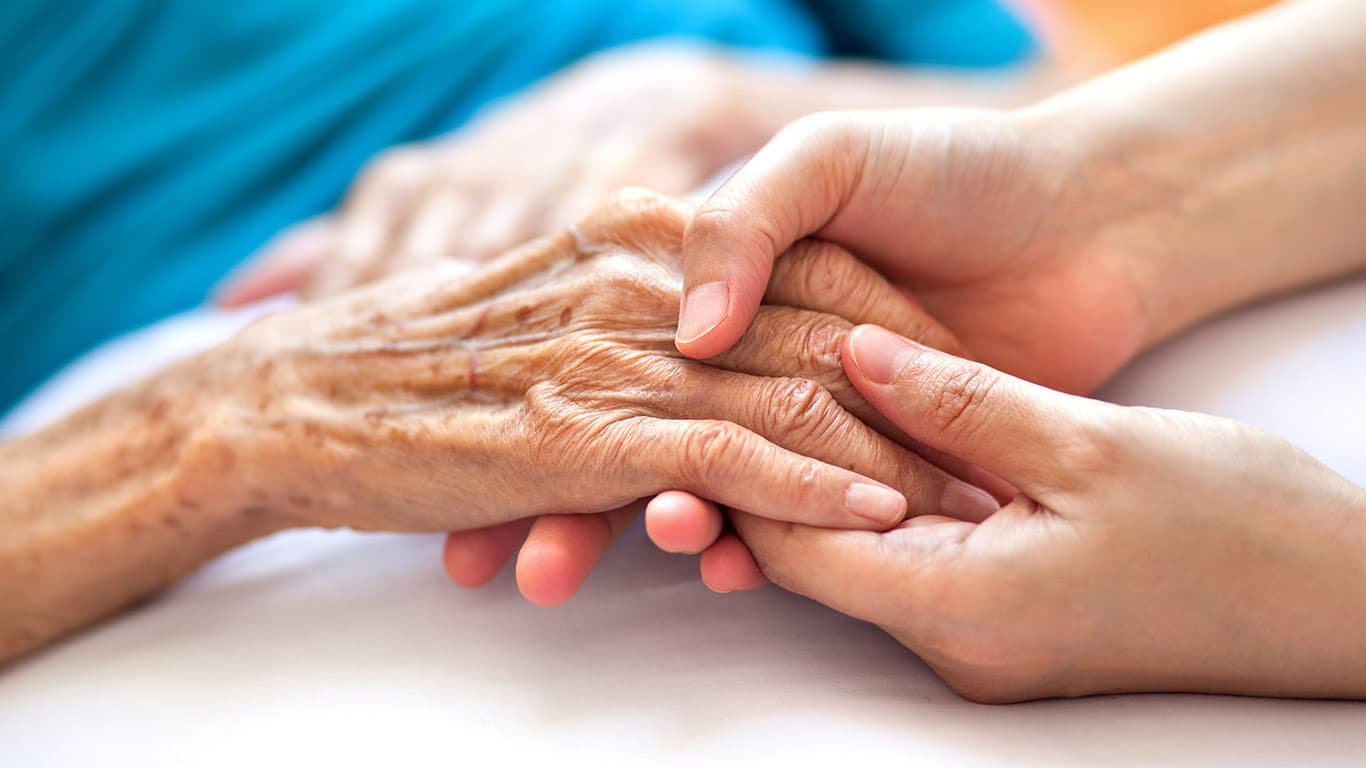 Senior adult staying active with supportive care
